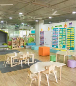 A colorful and welcoming children’s creche with vibrant furniture and play areas. Educational toys and activities are visible, creating a safe and stimulating environment for children of residents in Dosti West County, Thane.